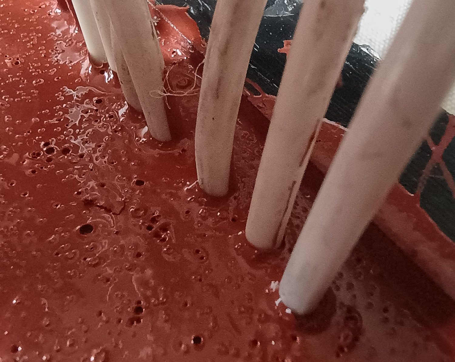 Connector pins encapsulated with polyurea gel
