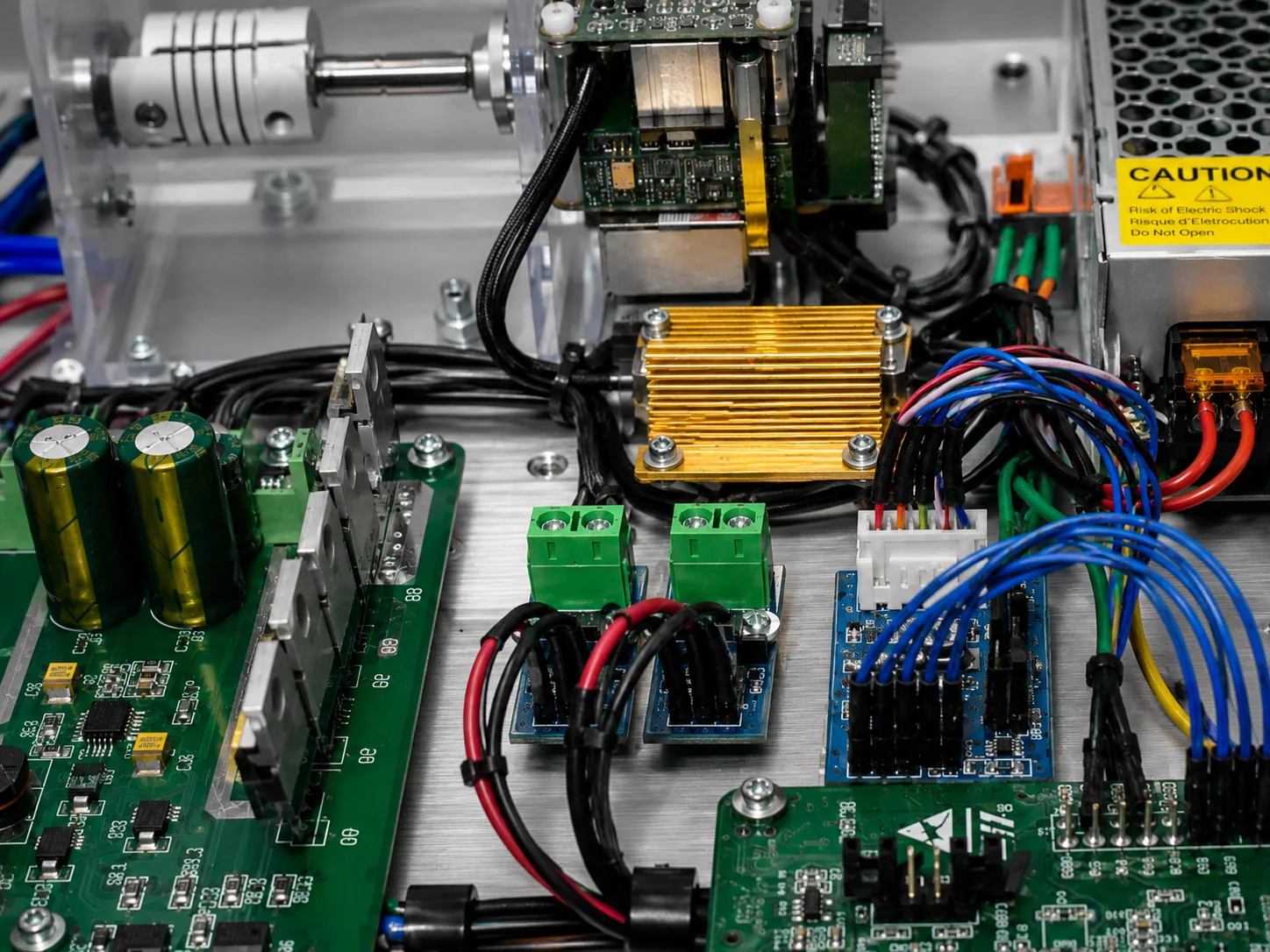 Electronics prototype with power components, wiring, and measurement setup for load and thermal validation